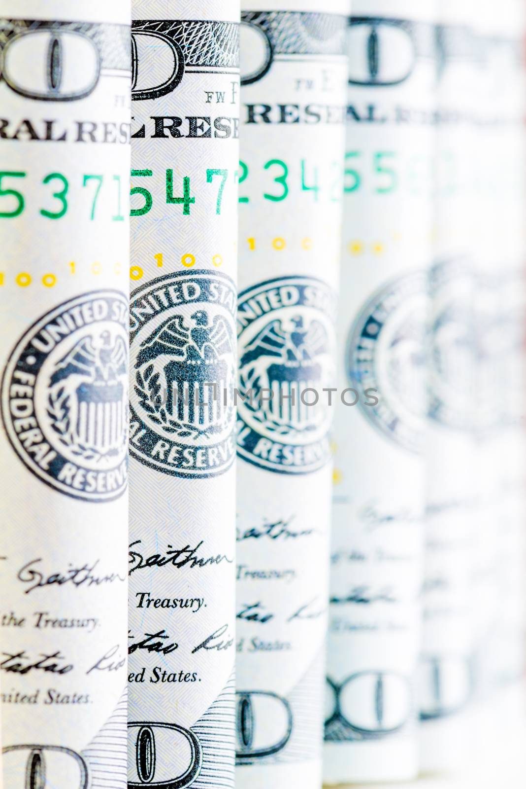 Macro shot of American 100 dollar bills by kosmsos111