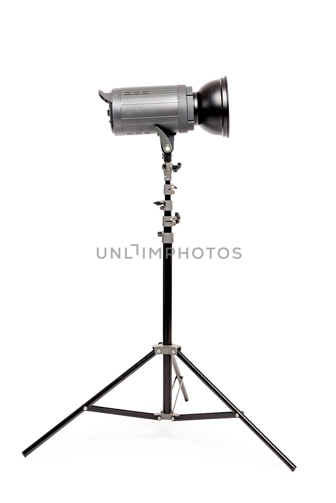 side view powerful photo flash on rack on a white background in the studio