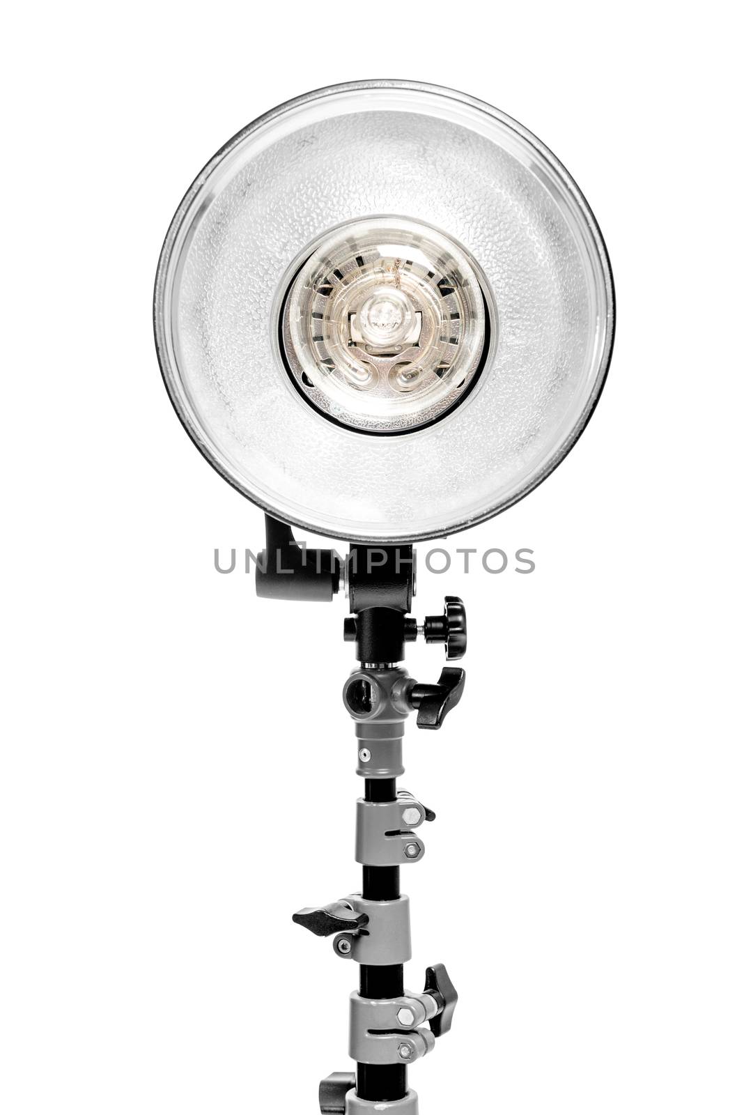 powerful photo flash lamp on rack on white background in studio by kosmsos111