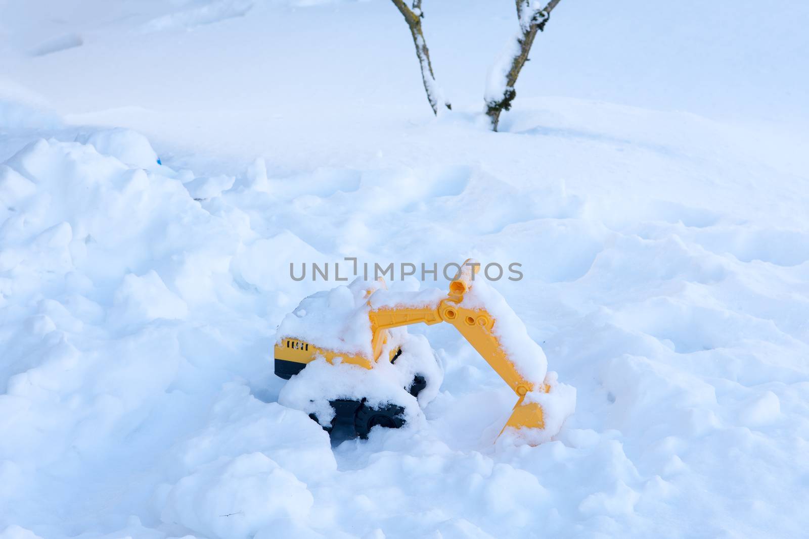 Children's toy forgotten in the snow by ben44