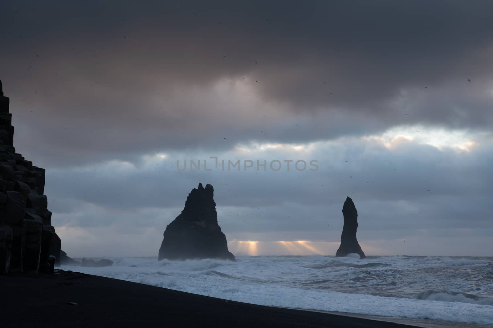 Rock spire of Reynisdrangur, coast of Reynisfjara close to Vik, Iceland, Europe