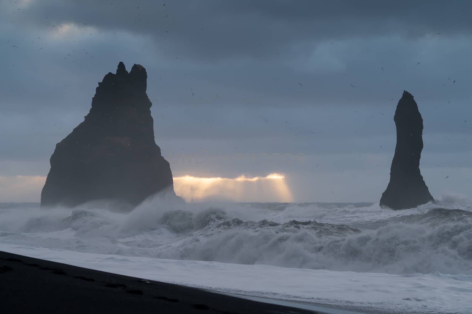 Rock spire of Reynisdrangur, coast of Reynisfjara close to Vik, Iceland, Europe