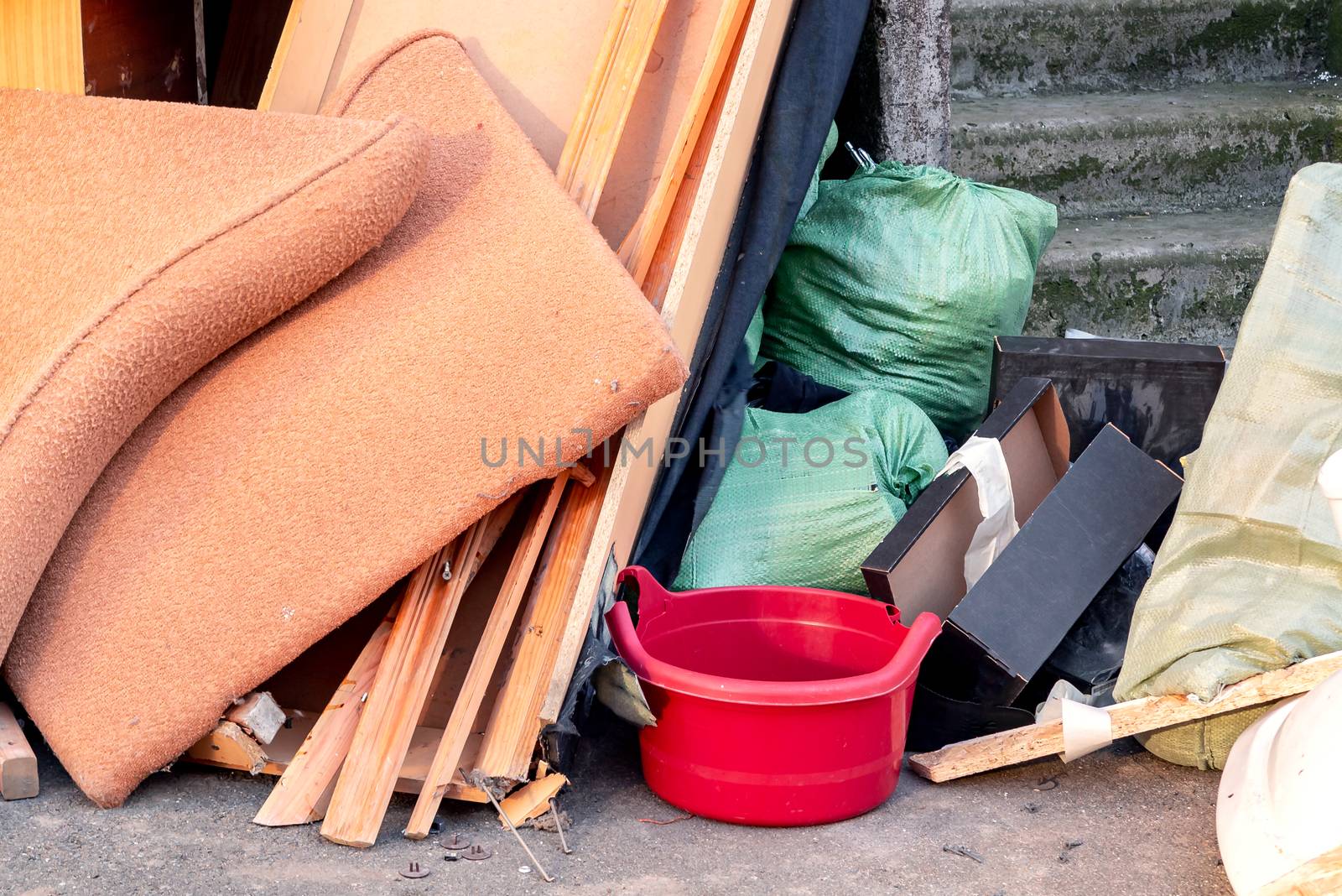 A pile of trash, garbage and old furniture submitted for disposal in the trash by galsand