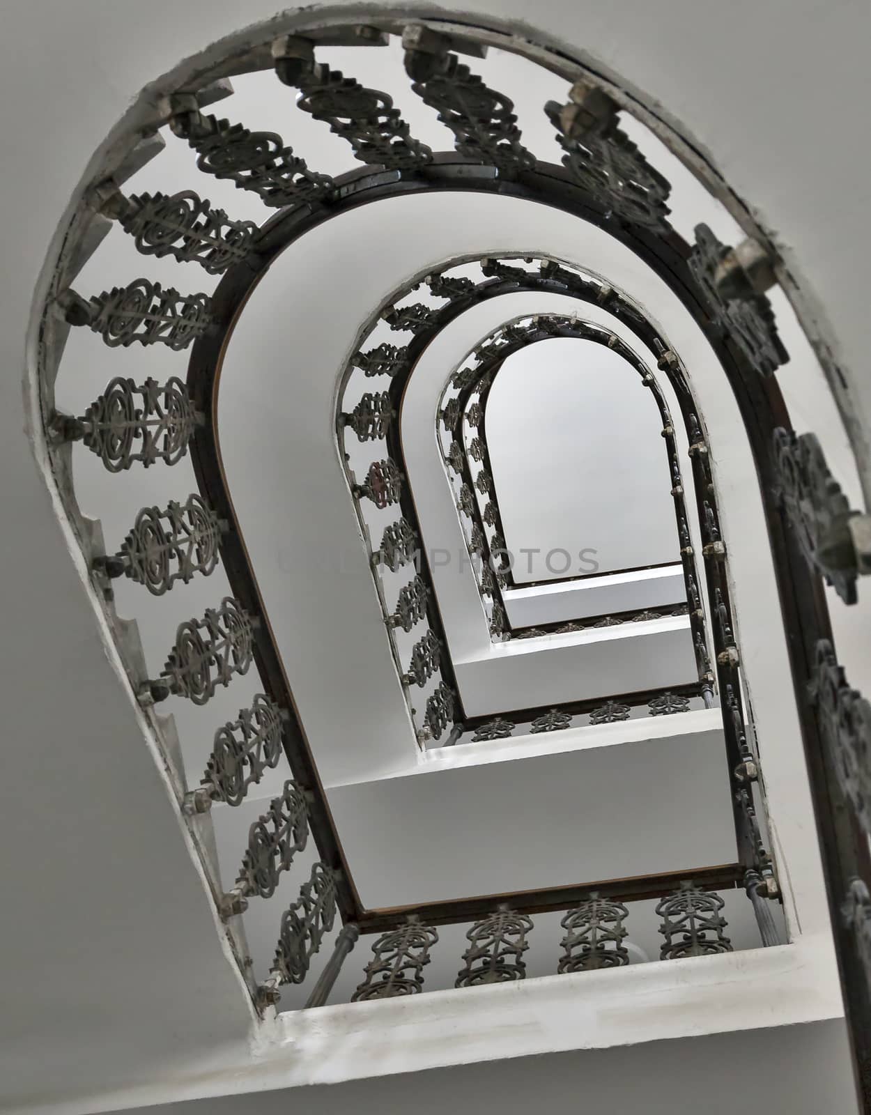 Spiral staircase in a residential house in Wien, view from below