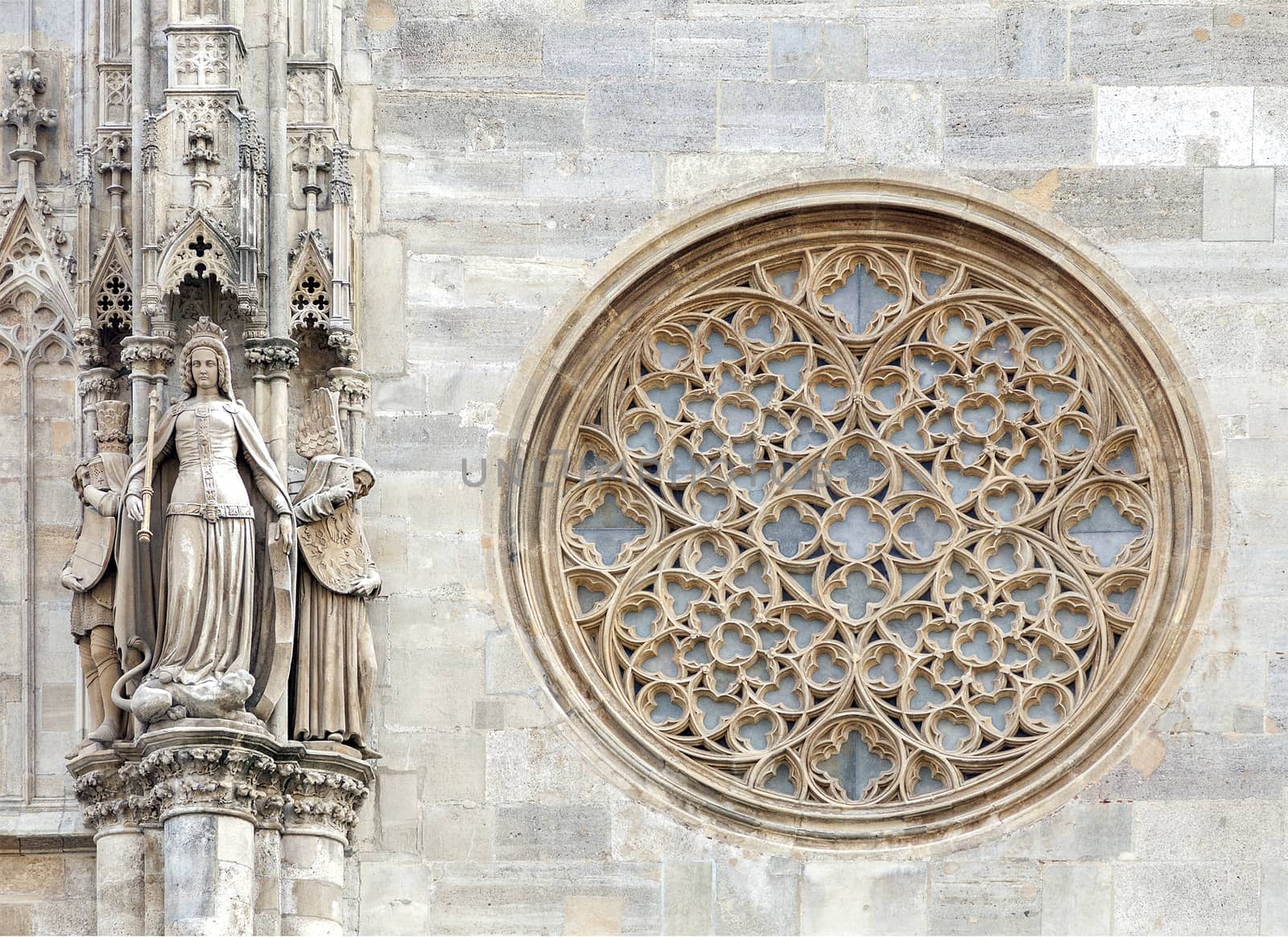 Round gothic window on the facade of the St. Stephen's cathedral, Vienna, Austria