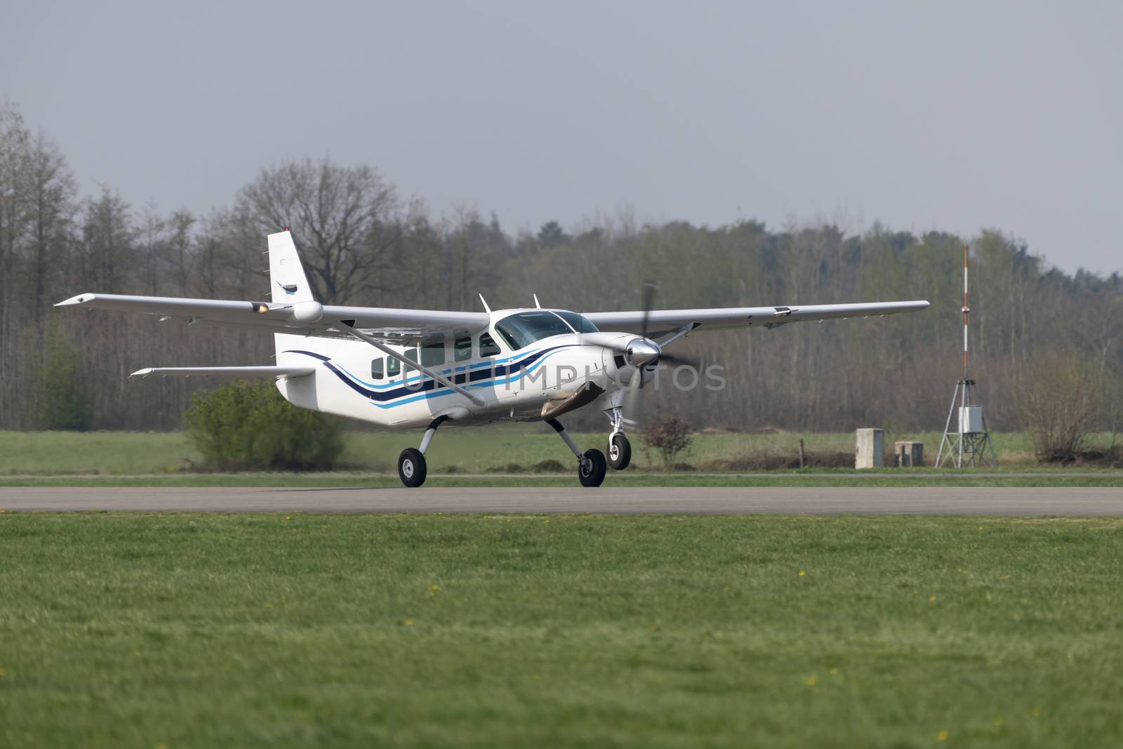 Single-engine business airplane during take off
 by Tofotografie