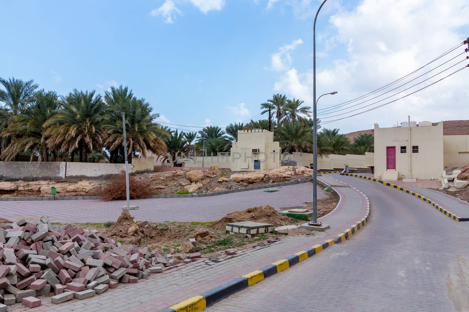 Landscape paving works in a village in Oman by galsand