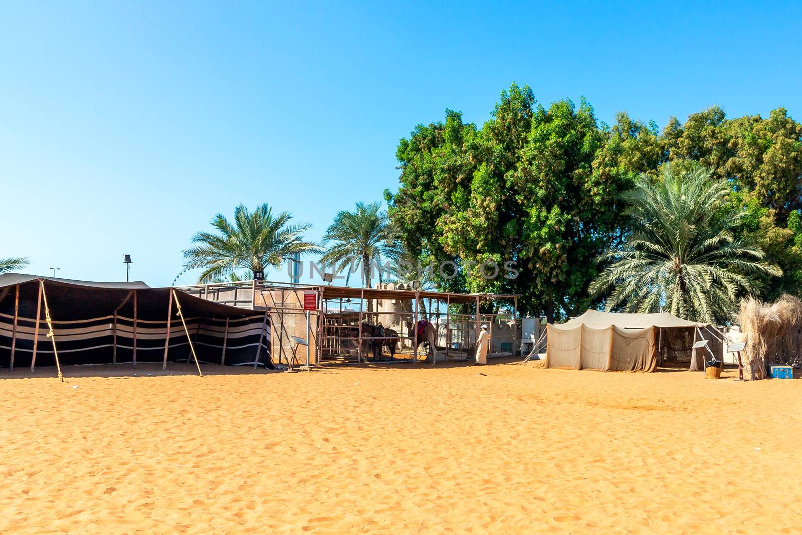 Decorative elements of urban improvement in the resort town - bed made of natural materials under a canopy, Heritage Village, Abu Dhabi by galsand