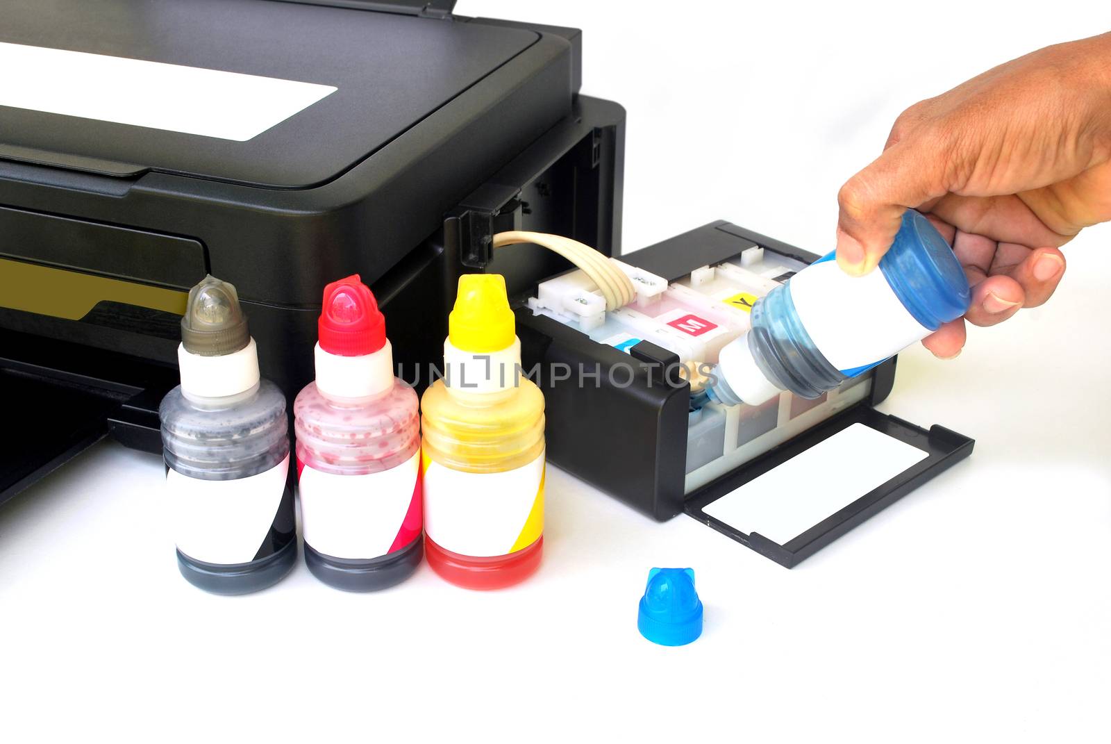 Four color printer on white background. by thitimontoyai