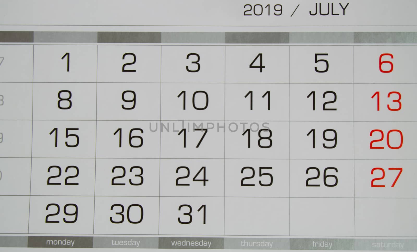 Calendar July 2019 with working days and weekends, close-up top view by claire_lucia