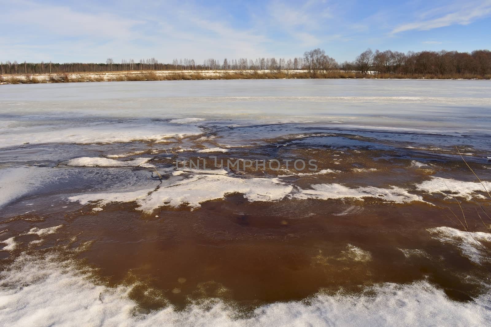river in early spring, the ice begins to melt