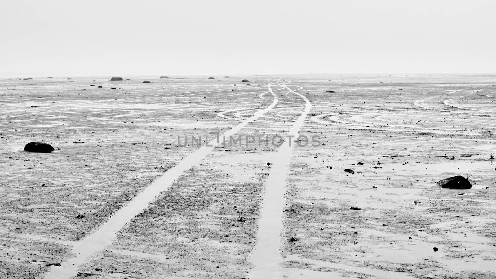 rut on the sandy shore,black and white image