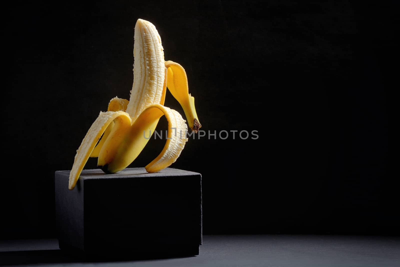 Concept with Half peeled banana  by mady70