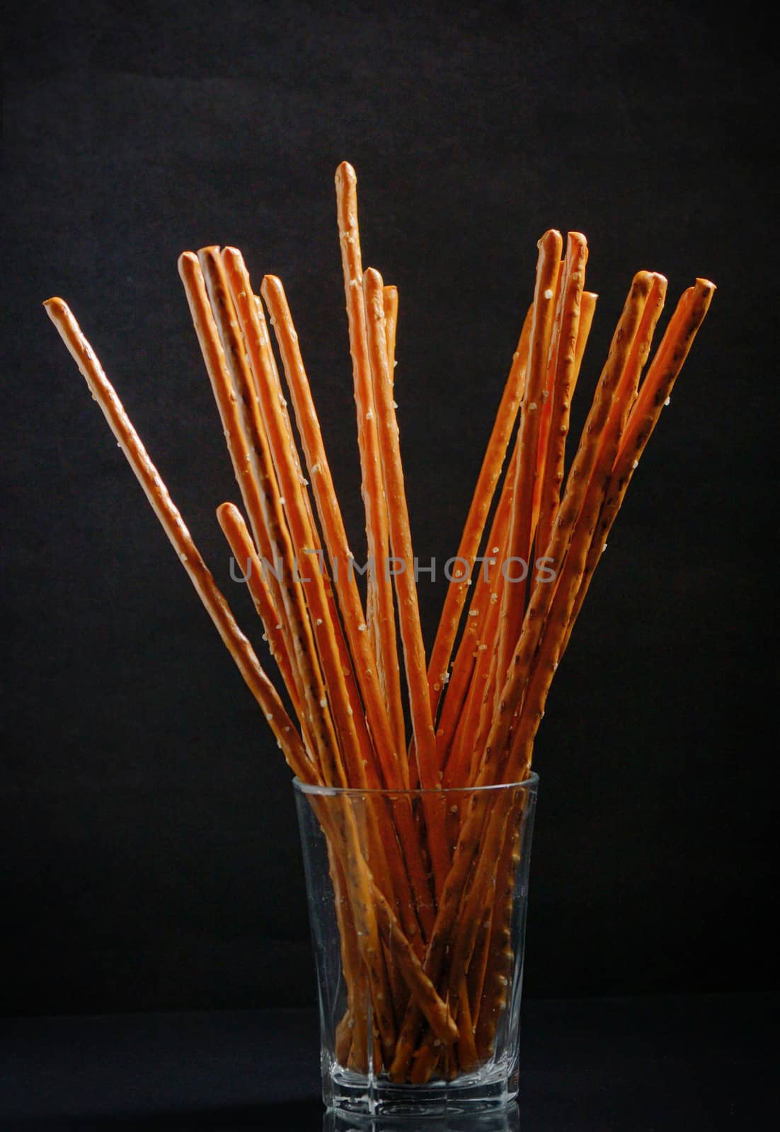 Pretzel sticks in small glass  by mady70