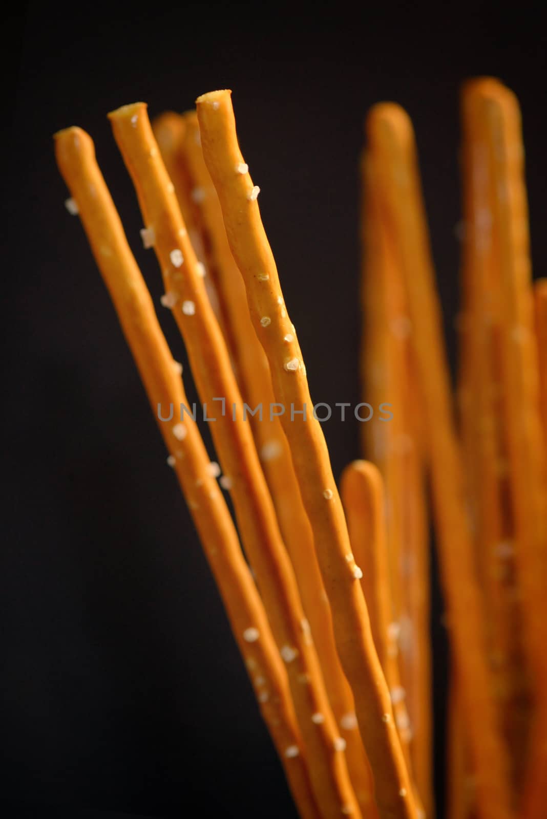 Details of Pretzel sticks on black background