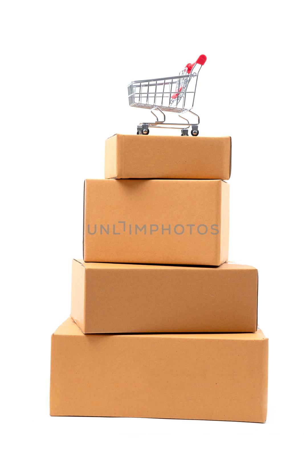 red shopping cart on brown parcels box