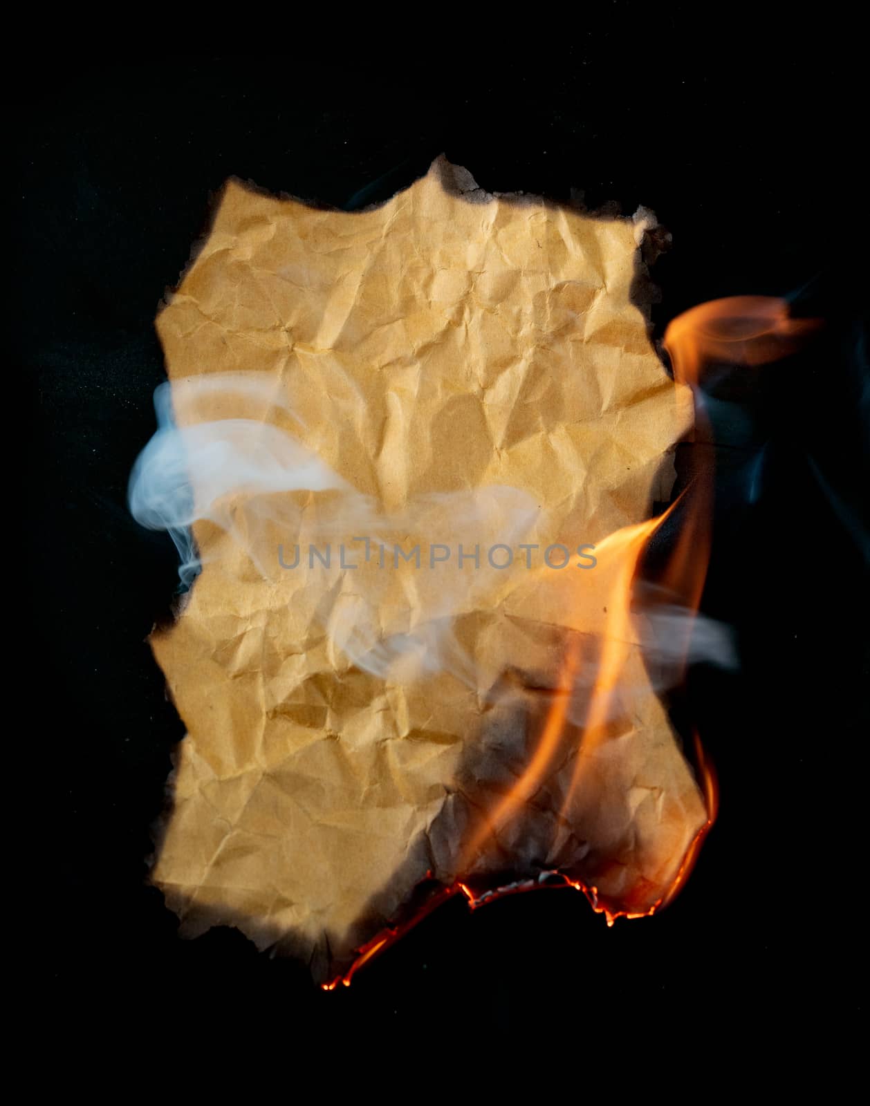 
burning piece of crumpled paper by anankkml