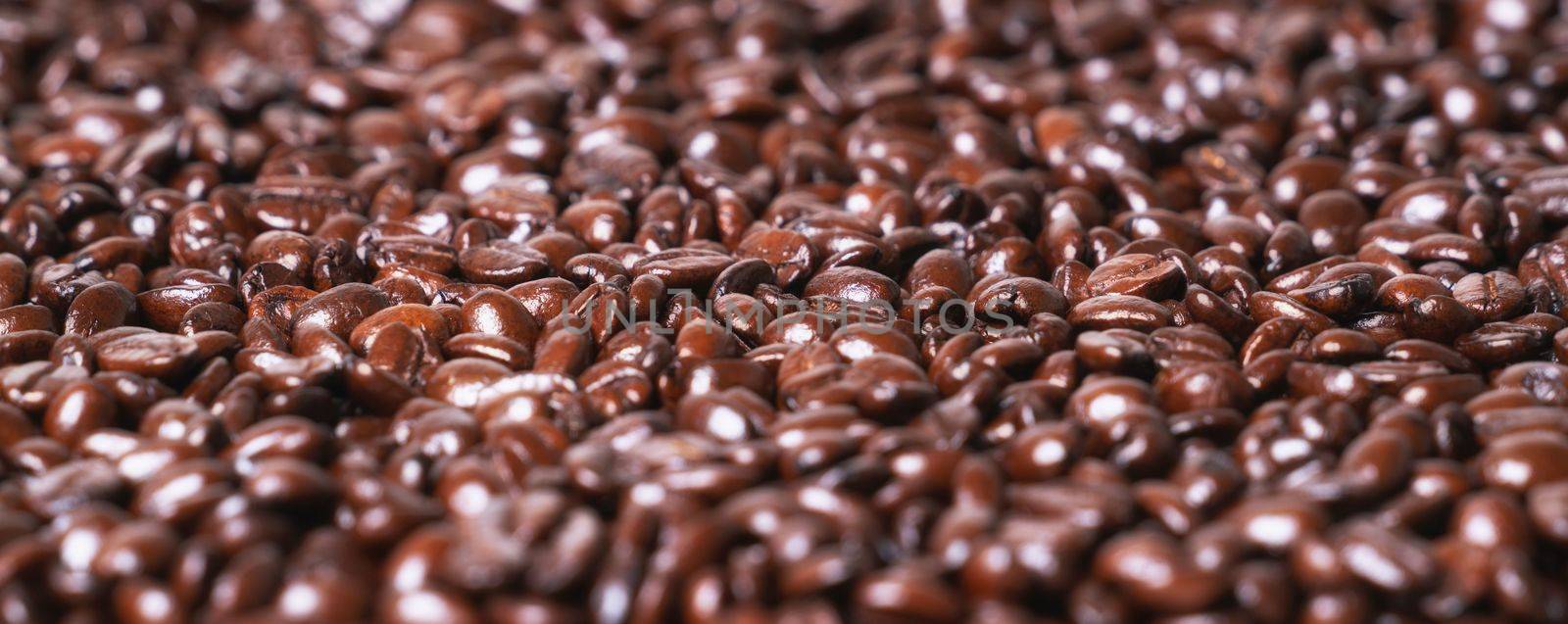 Roasted coffee beans on a flat background by anankkml