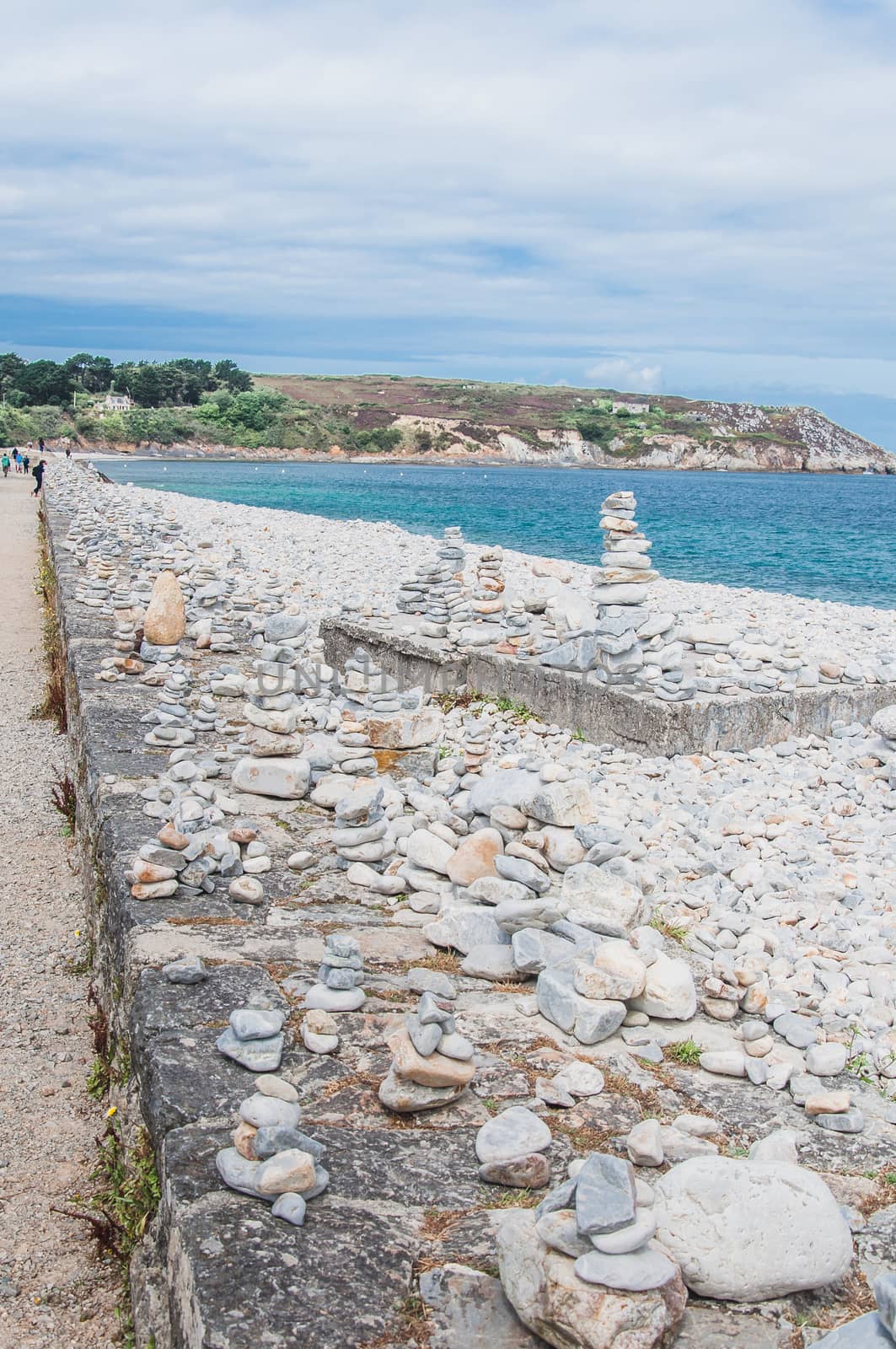 Pebbles in balance near Notre Dame de Rocamadour in Camaret-sur-mer in Finistère, Brittany, France