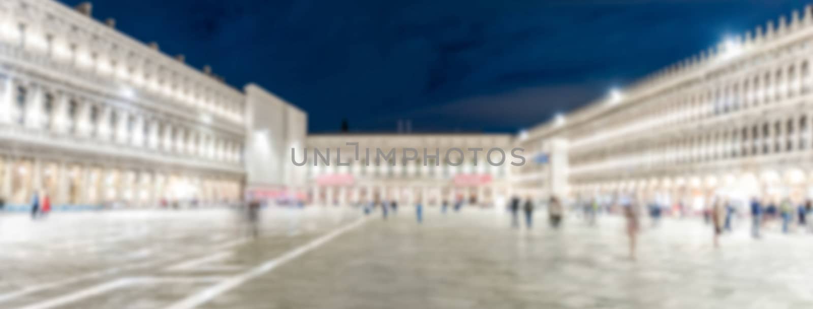 Defocused background of St. Mark's Square at night, Venice, Italy. Intentionally blurred post production for bokeh effect
