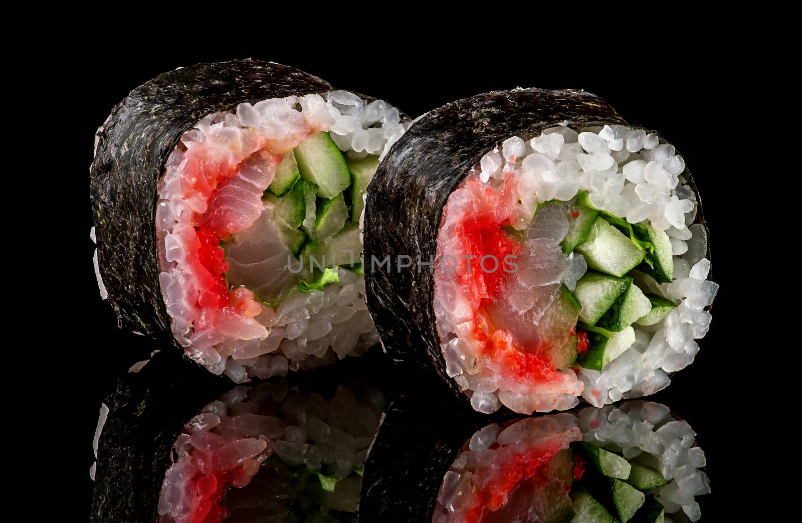 Two pieces roll spicy lollo-ross on a black background with reflection