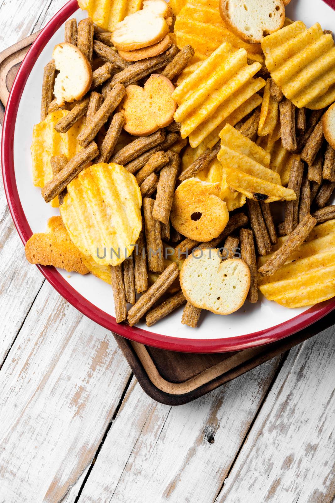 Crispy potato chips in bowl.Homemade potato chips