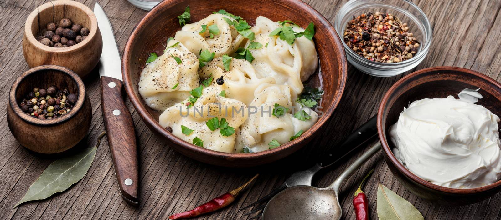 Delicious dumplings in the bowl on the table