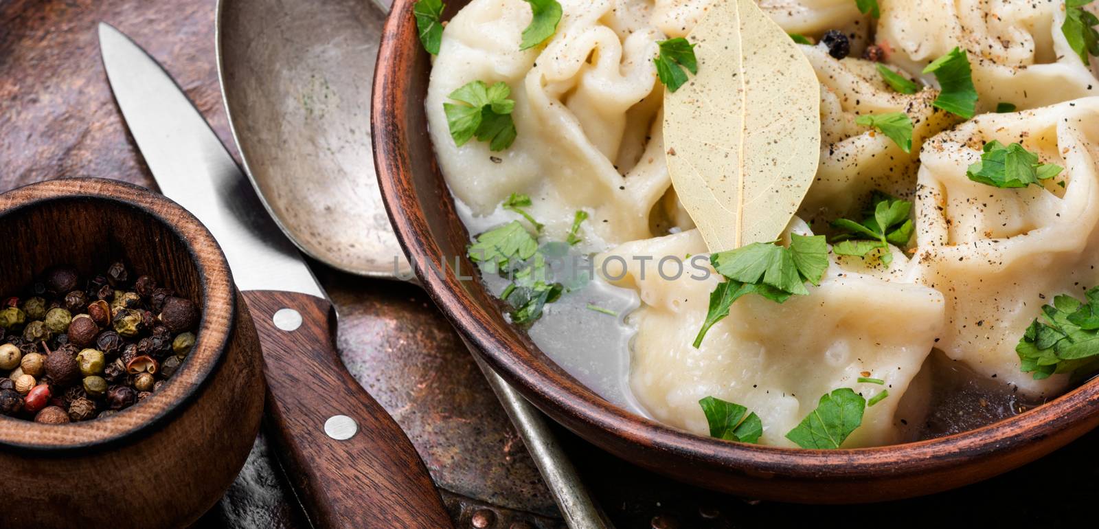 Delicious dumplings in the bowl on the table.Chinese dumplings for dinner