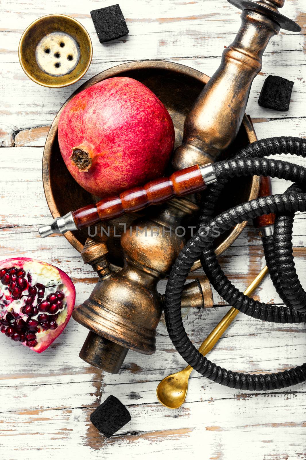 Hookah with fruit aroma for relax.Shisha hookah.Hookah with pomegranate.Pomegranate tobacco