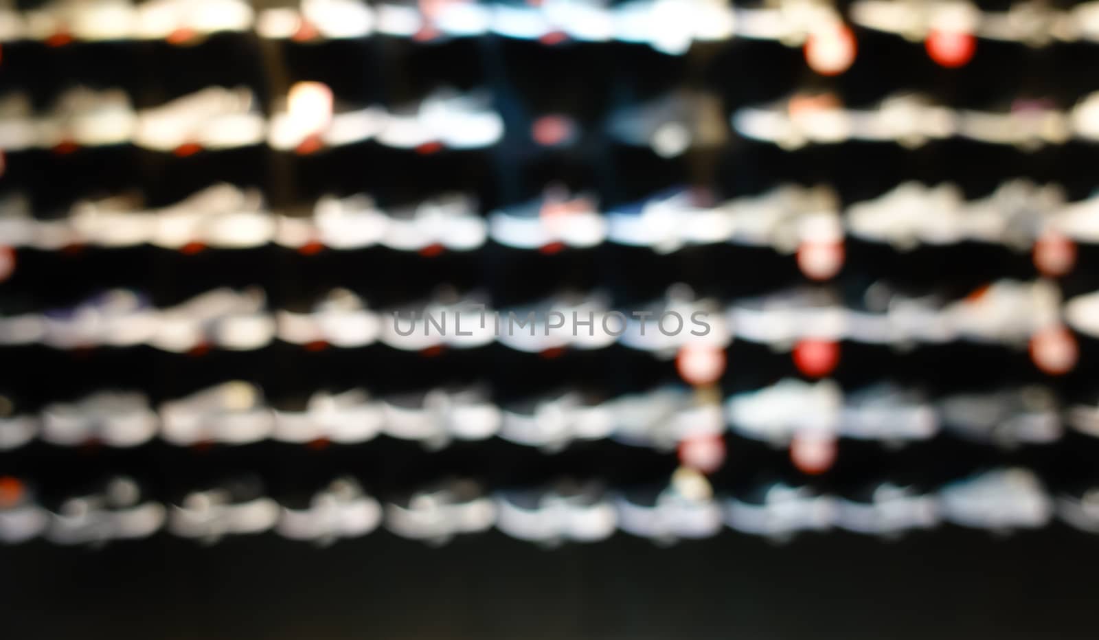 defocus shot of shoes on shelf in the store 