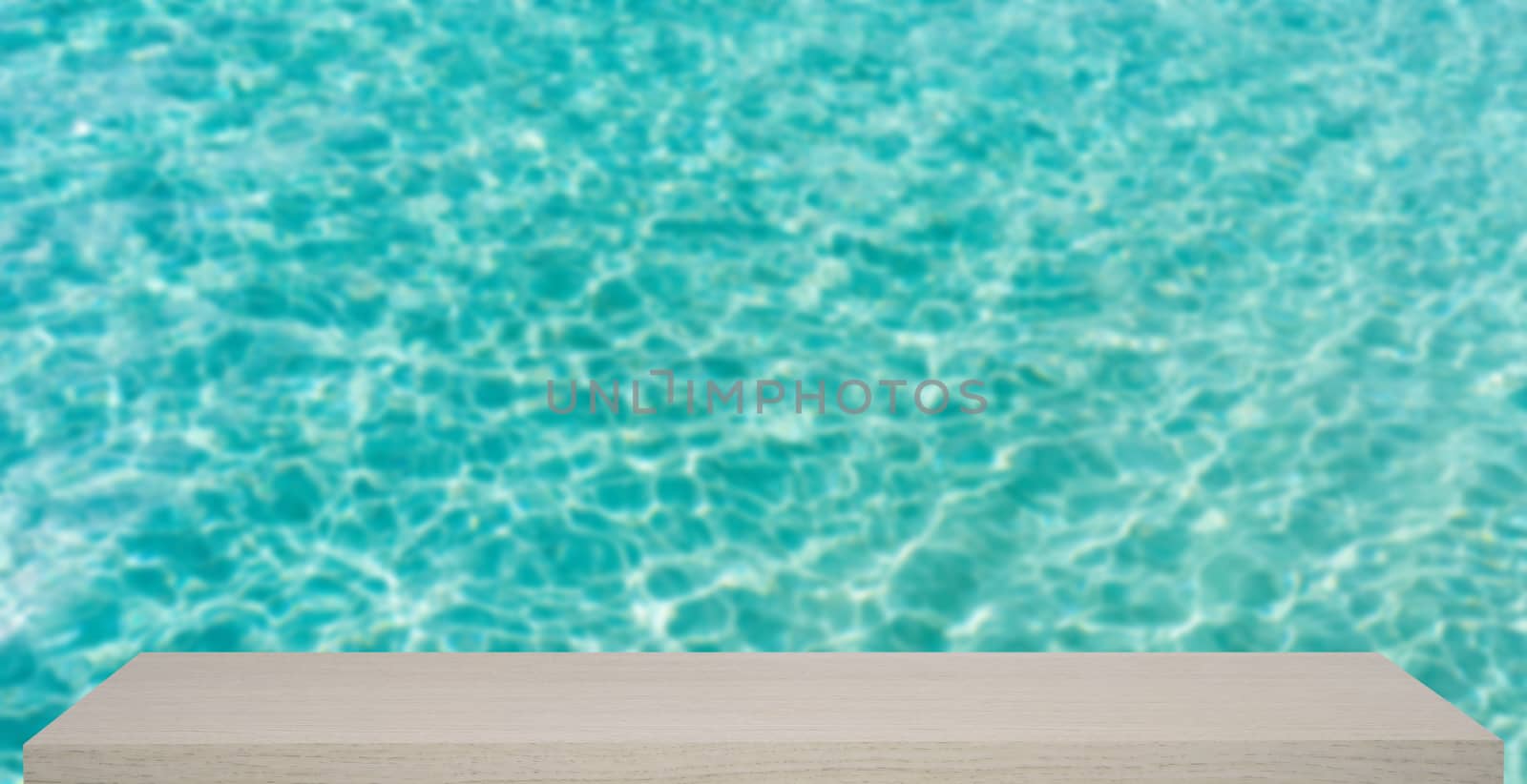 ocean transparent blue water defocus background with wooden shelf

