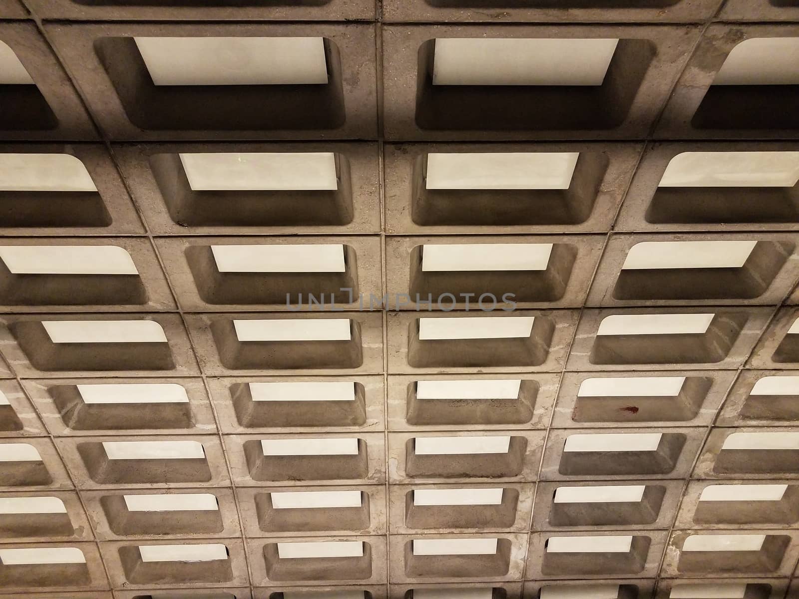 grey cement rectangular curved ceiling in building by stockphotofan1