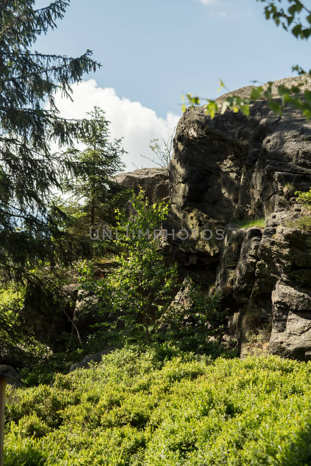 Giant rocks on a mountain with blue sky