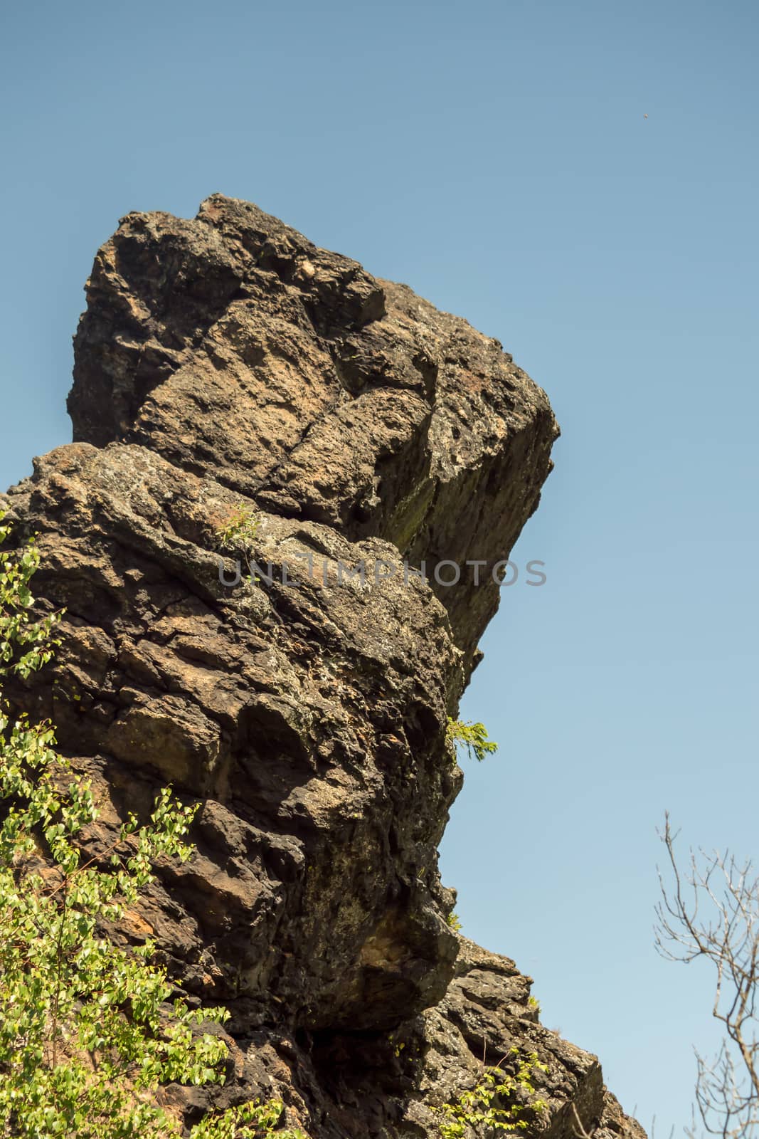 Giant rocks on a mountain with blue sky by sandra_fotodesign