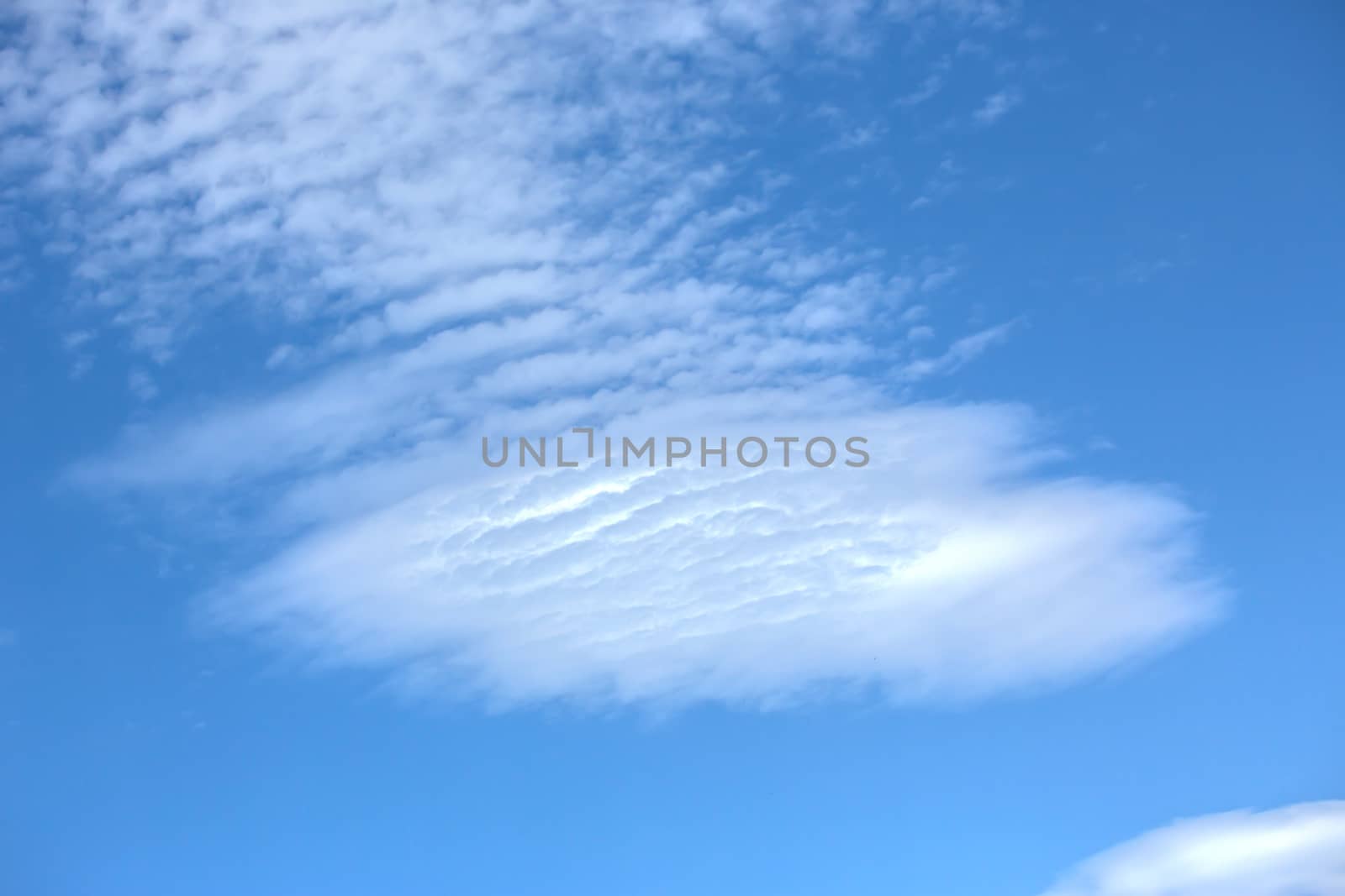 Clouds on the blue sky, texture or background