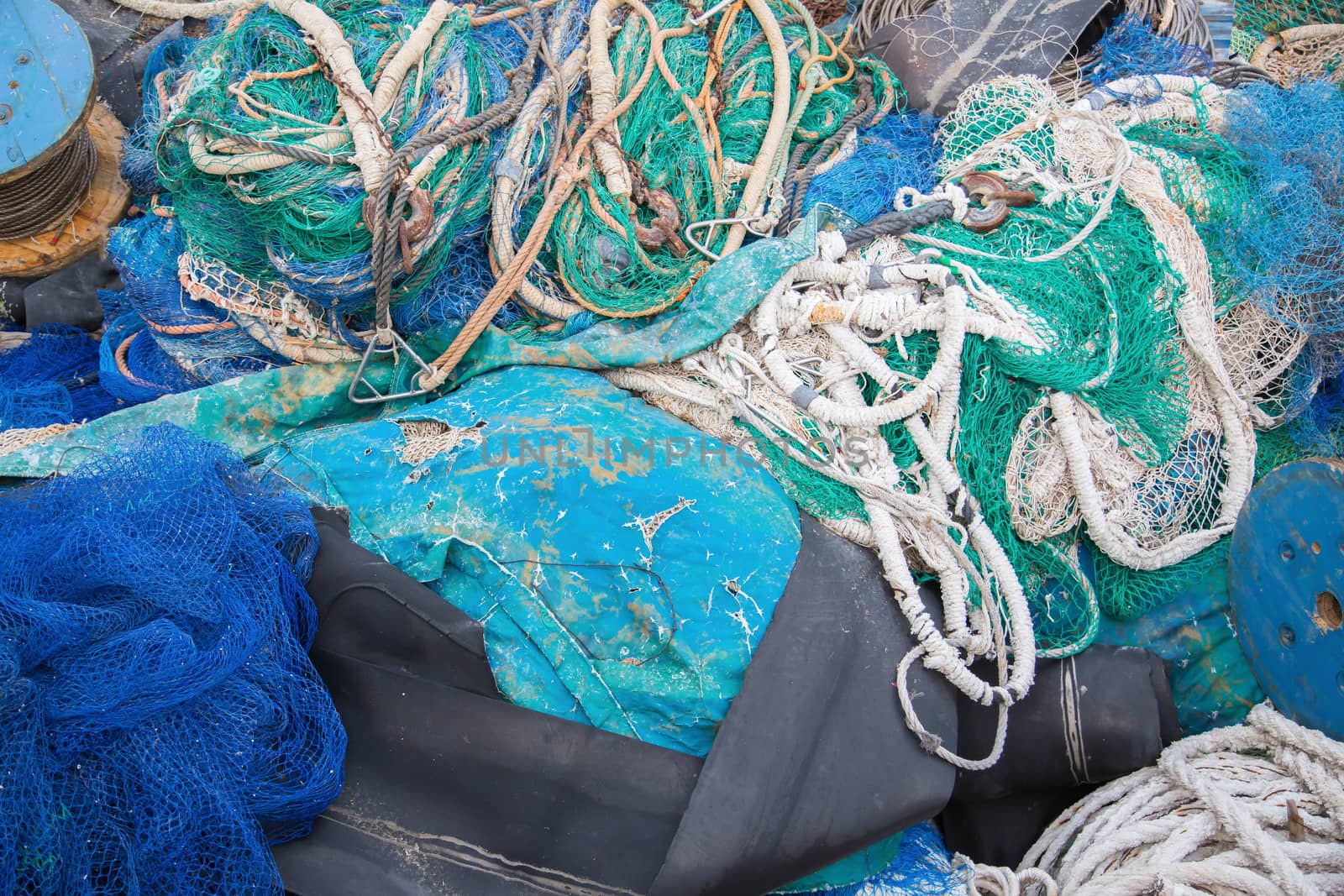 A big pile of nets, ropes and fishing accessories by sandra_fotodesign