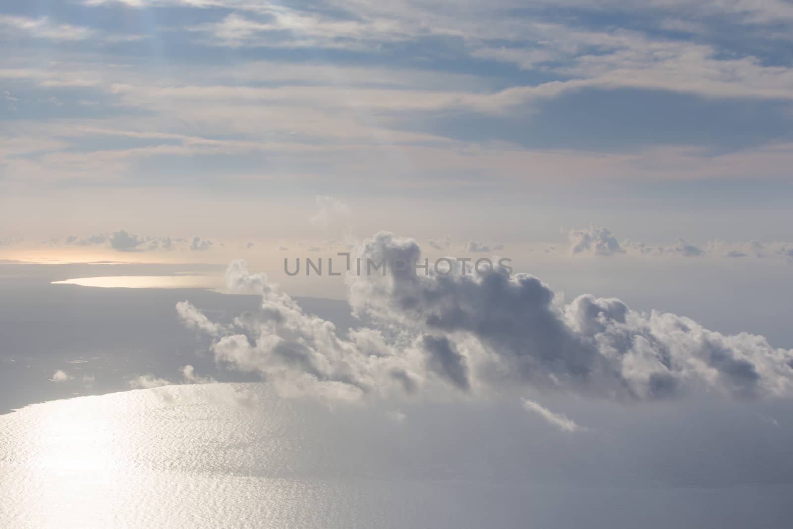 Clouds in the sky, view from an airplane by sandra_fotodesign