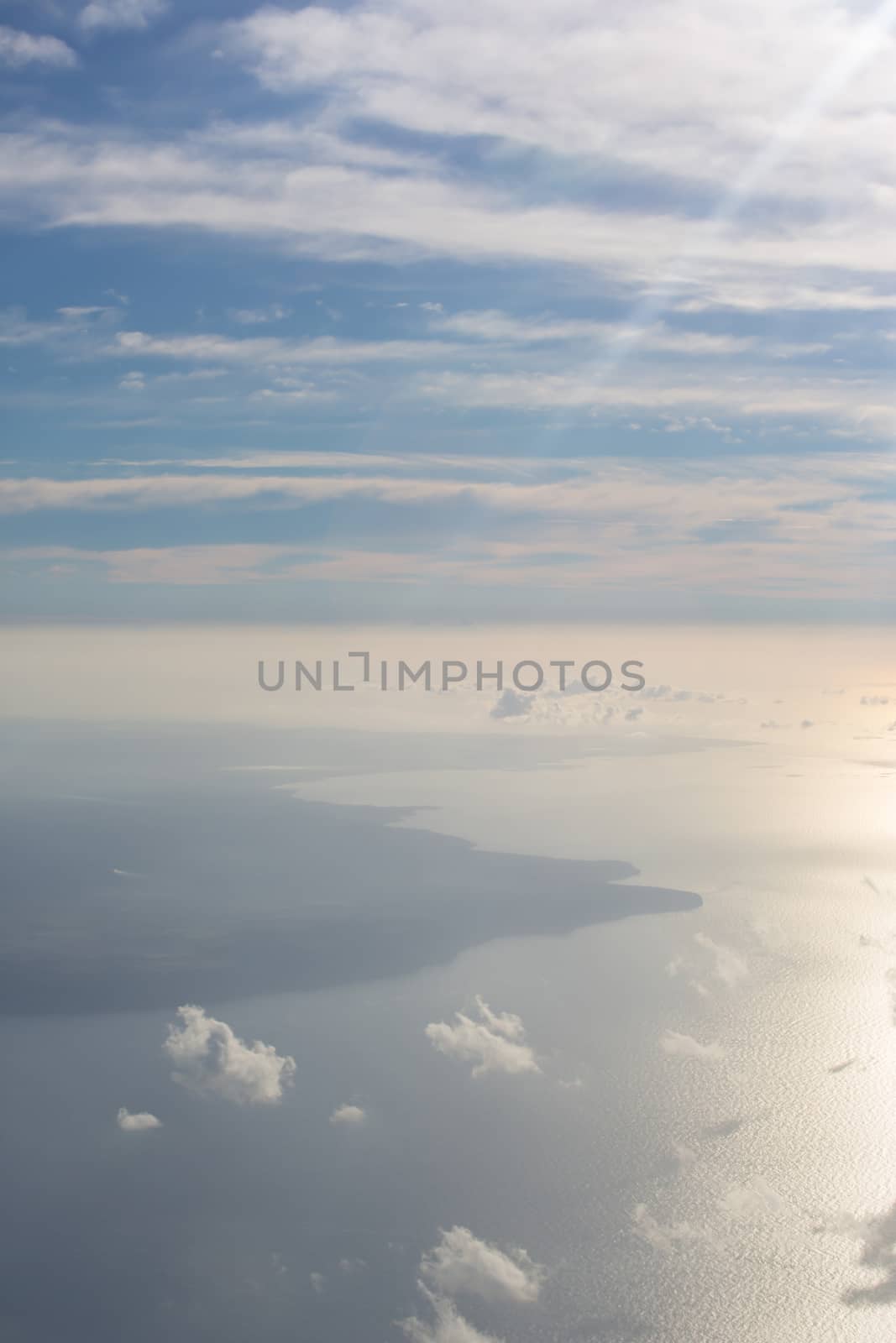 Clouds in the sky, view from an airplane by sandra_fotodesign