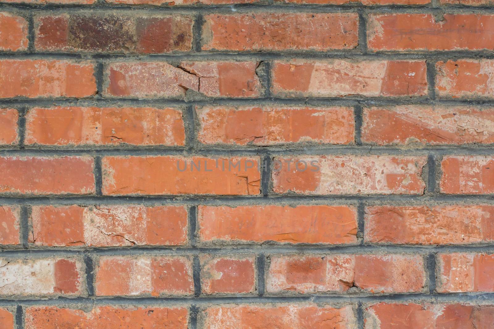 A wall of red brick stones, texture or background by sandra_fotodesign