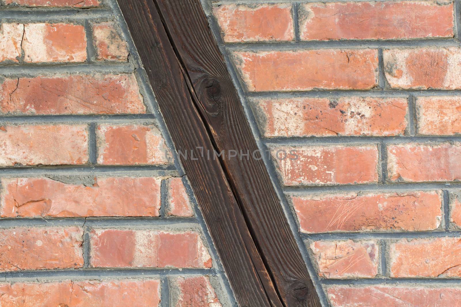 A wall of red brick stones, texture or background by sandra_fotodesign