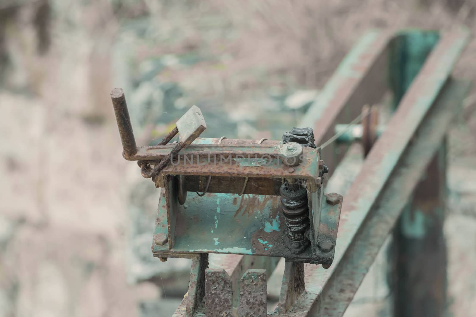 Old, rusty winch with soft bokeh by sandra_fotodesign