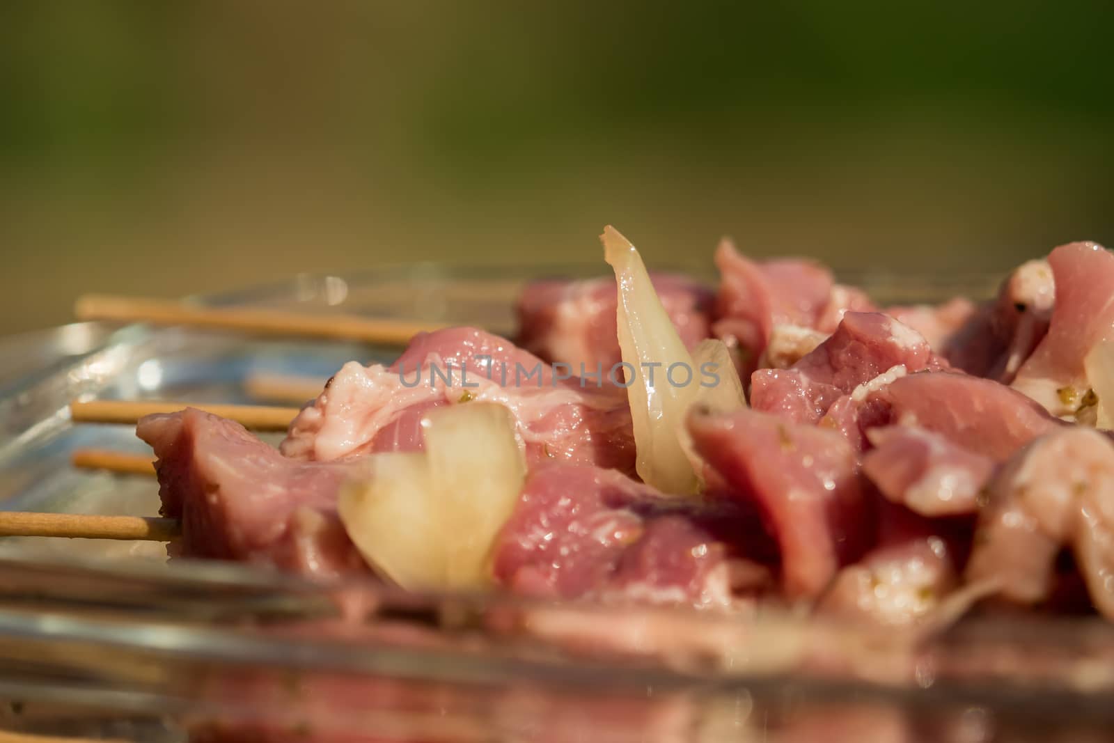 Raw meat skewers marinated before grilling by sandra_fotodesign