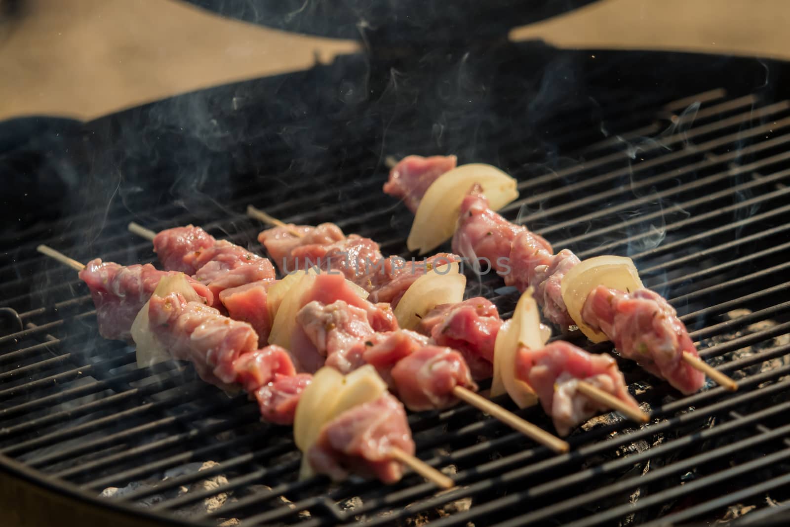 Delicious meat skewers on the hot grill by sandra_fotodesign