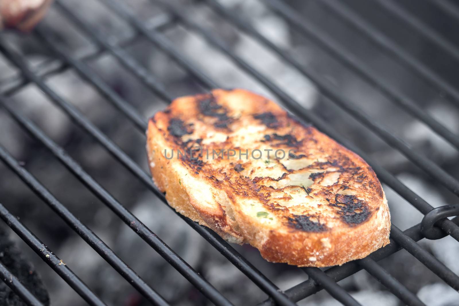 Toasted slice of white bread from the grill by sandra_fotodesign