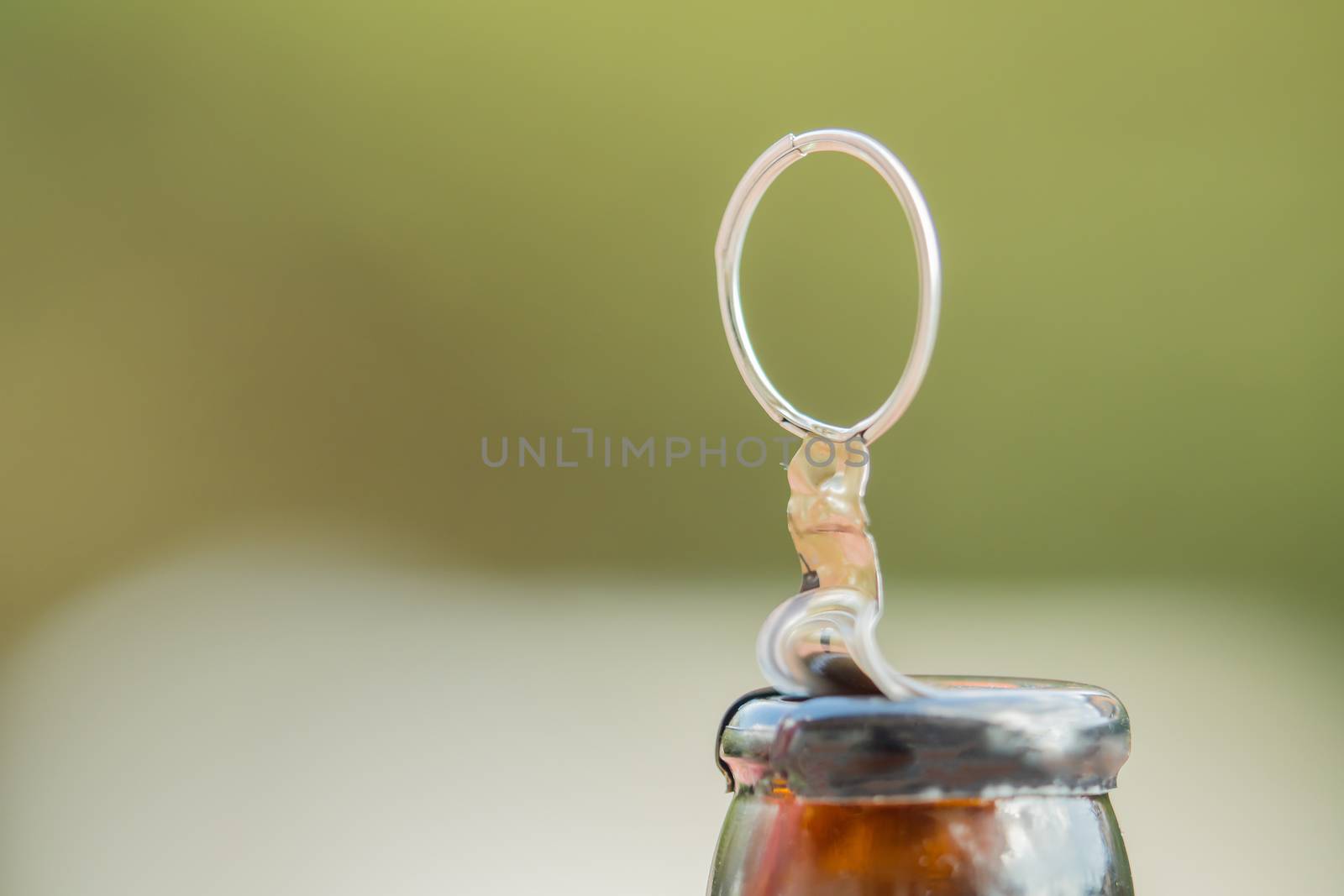 Opened bottle of a drink outdoor by sandra_fotodesign