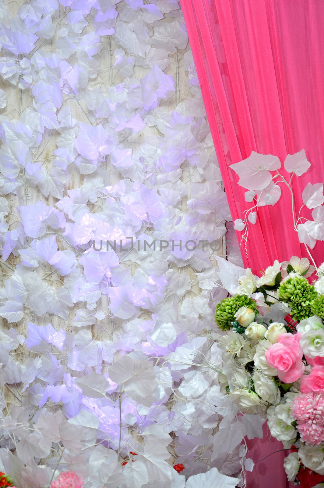 white flower decoration on the wall