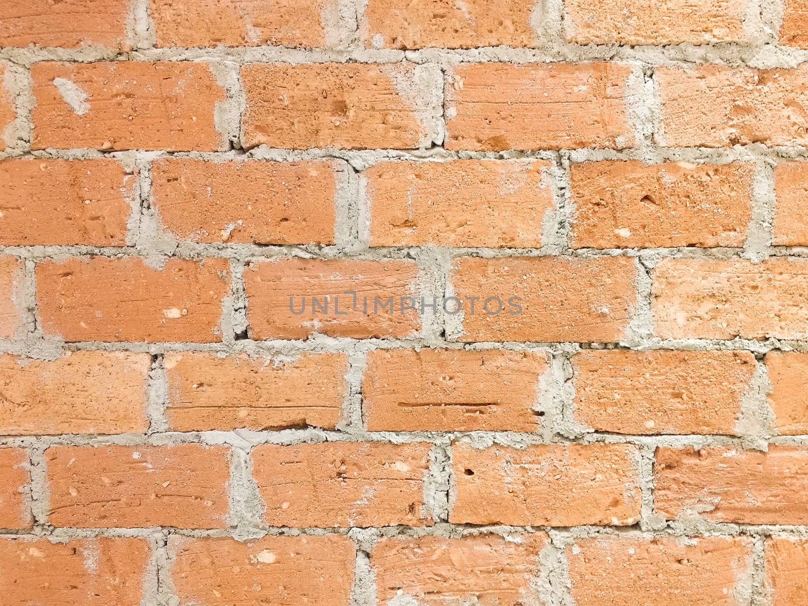 Clay and cement brick wall in horizontal direction, close-up