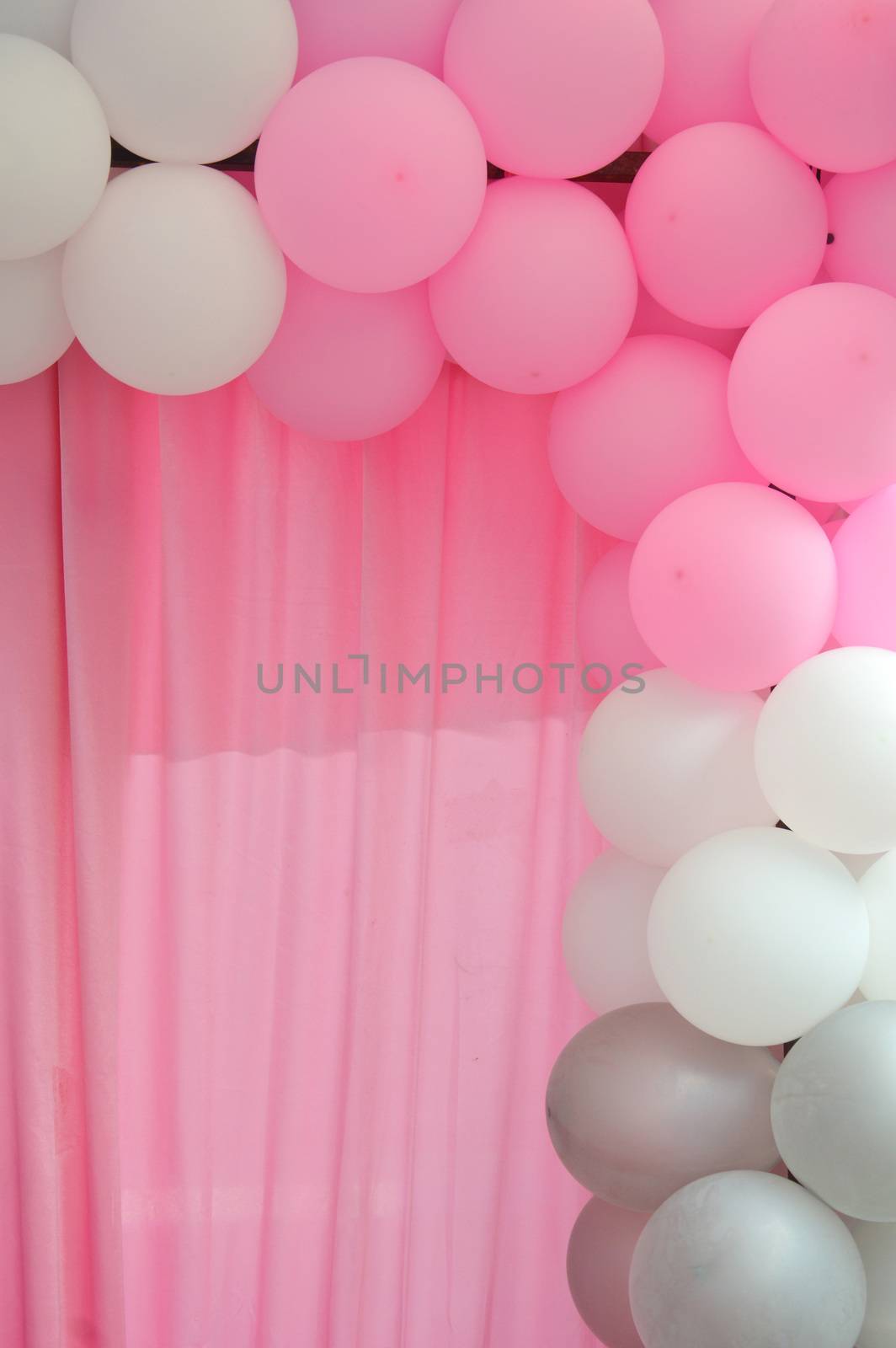 balloons frame on blank pink curtain  background