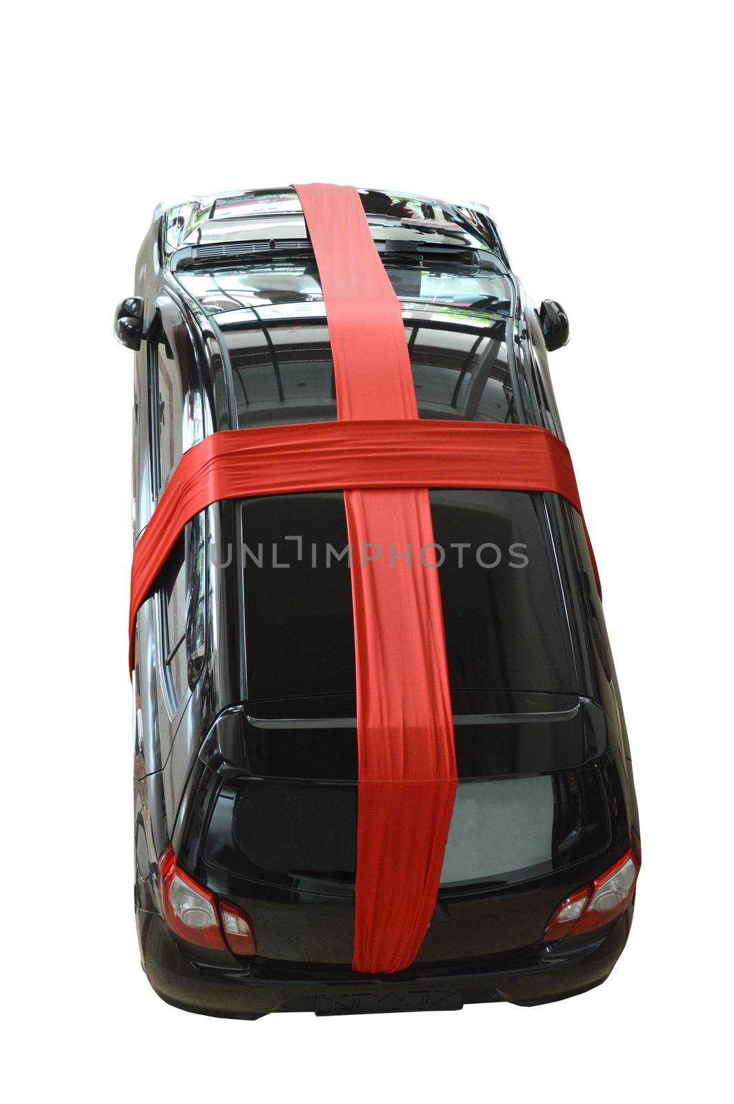 black car gift with red ribbon on white background