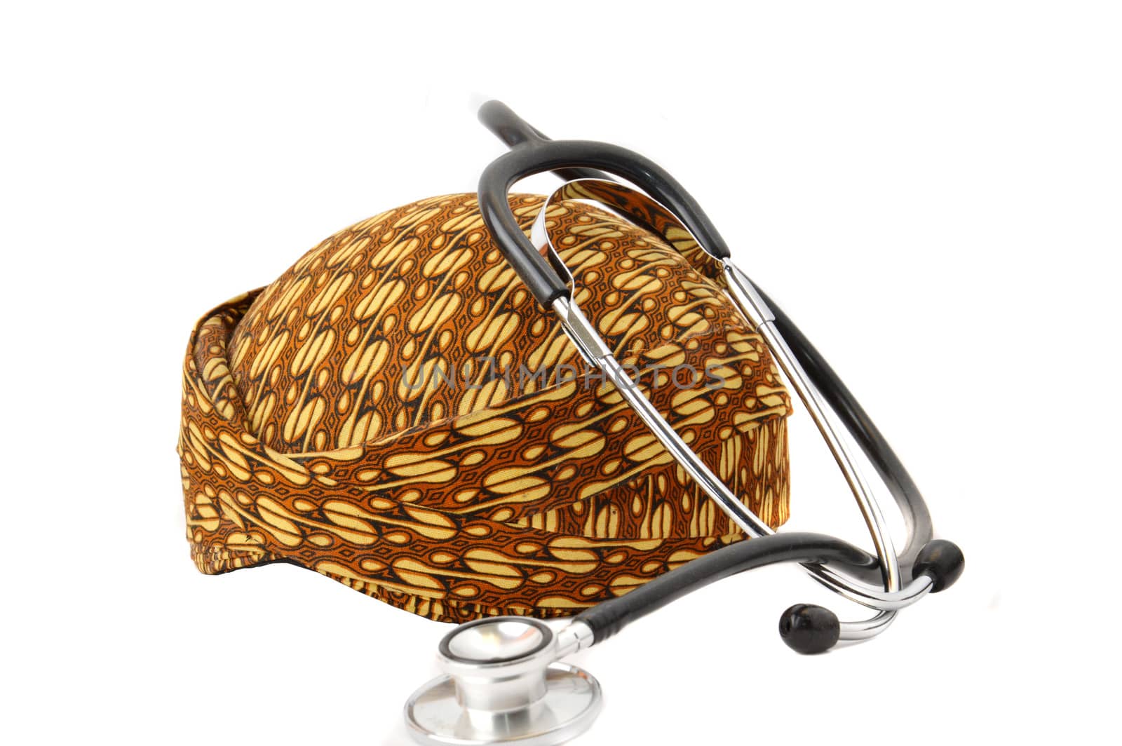 blangkon a traditional hat Javanese men with stethoscope on white background